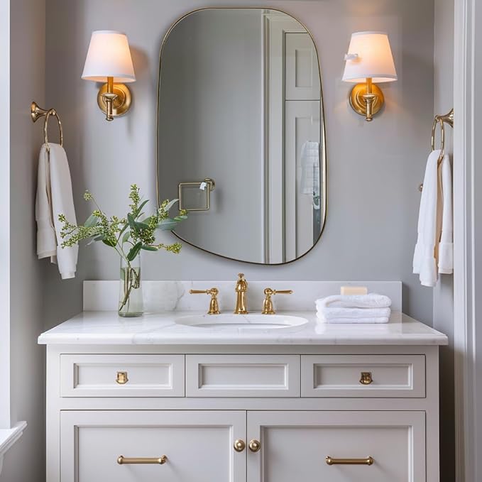 ANDY STAR Gold Bathroom Mirror, 22"x30" Brushed Brass Asymmetrical Wall Mirror in Stainless Steel Metal Frame, Unique Vanity Mirror with Modern Curved Design, Ideal for Bathroom, Bedroom, Entryway