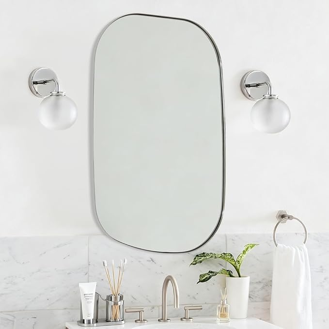 ANDY STAR Chrome Irregular Mirror, 24"x36" Silver Asymmetrical Wall Mirror in Stainless Steel Metal Frame, Unique Vanity Mirror with Modern Curved Design, Ideal for Bathroom, Bedroom, Entryway